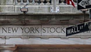 Wall Street coasts to the finish of its best week in the last five