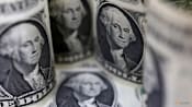 Dollar slips as traders await Fed interest rate decision