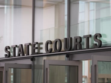 A view of the entrance to the State Courts building.