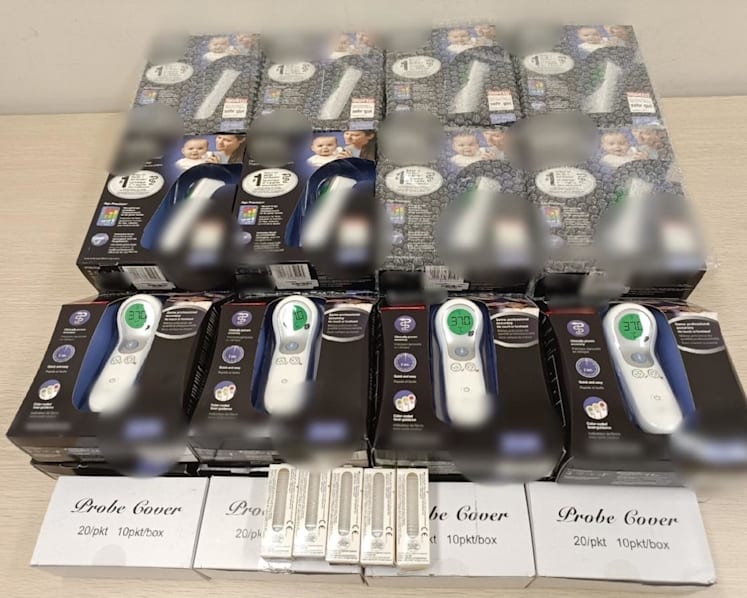 Woman arrested for online sale of counterfeit thermometers, items worth more than S$14,000 seized