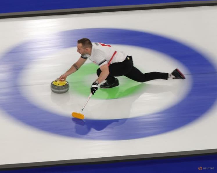 Curling-Swiss couple Paetz and Michel win medals at Games