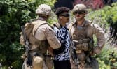 US Marines make first detention in Los Angeles as more protests expected