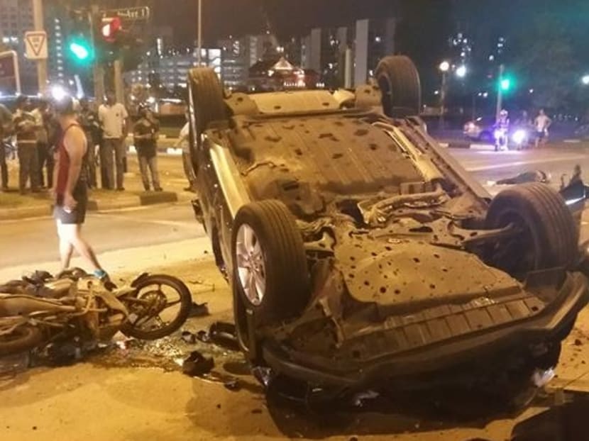 A 30-year-old motorcyclist was killed in an accident involving a car, a lorry and two motorcycles at the junction of Woodlands Avenue 12 and Woodlands Avenue 1 on Monday (Aug 7) evening. Photo: Zack Leo/Facebook