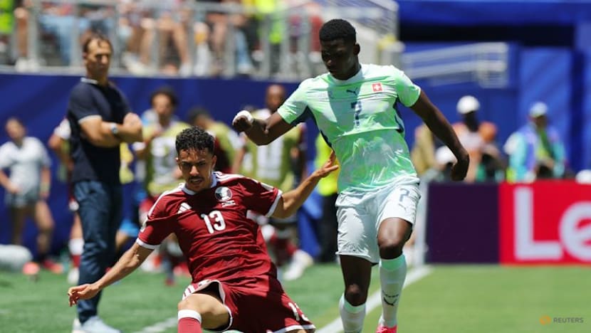 Qatar hail first World Cup point after late goal stuns Switzerland​ in 1-1 draw ​