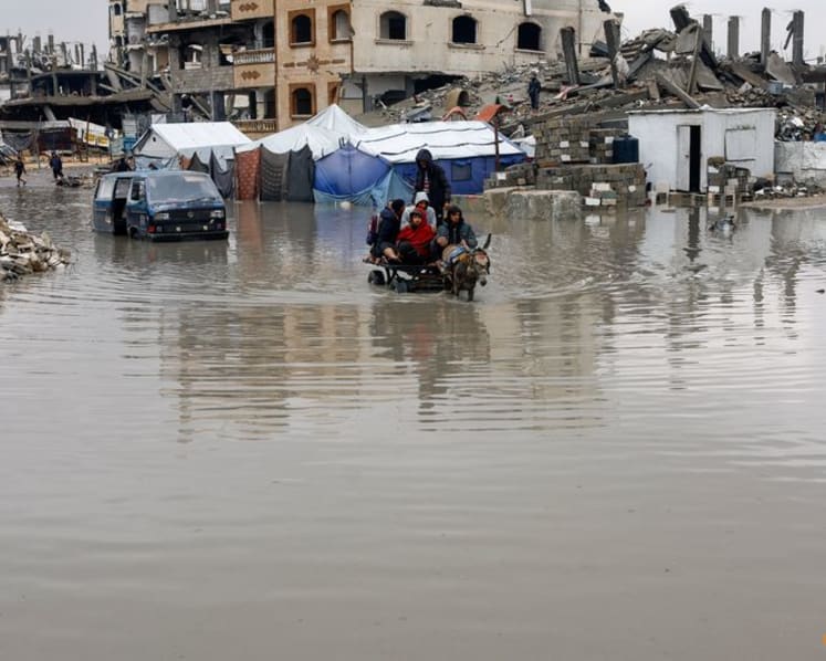 Gaza families struggle to recover from days of torrential rains that killed 12 people