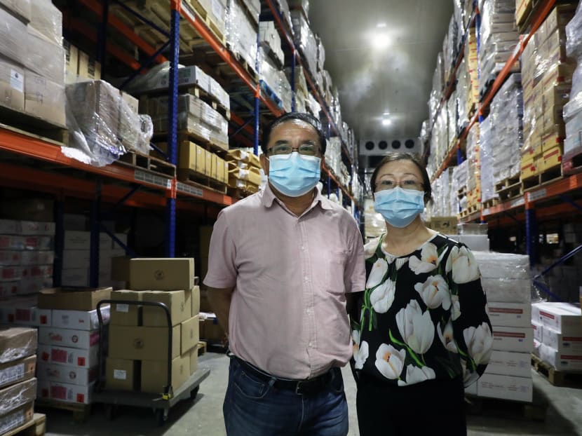 Mr Tia Tang Chye (left), owner of frozen food wholesaler New Multi, and finance head Nellie Tia (right) decided to branch out to selling to consumers directly.
