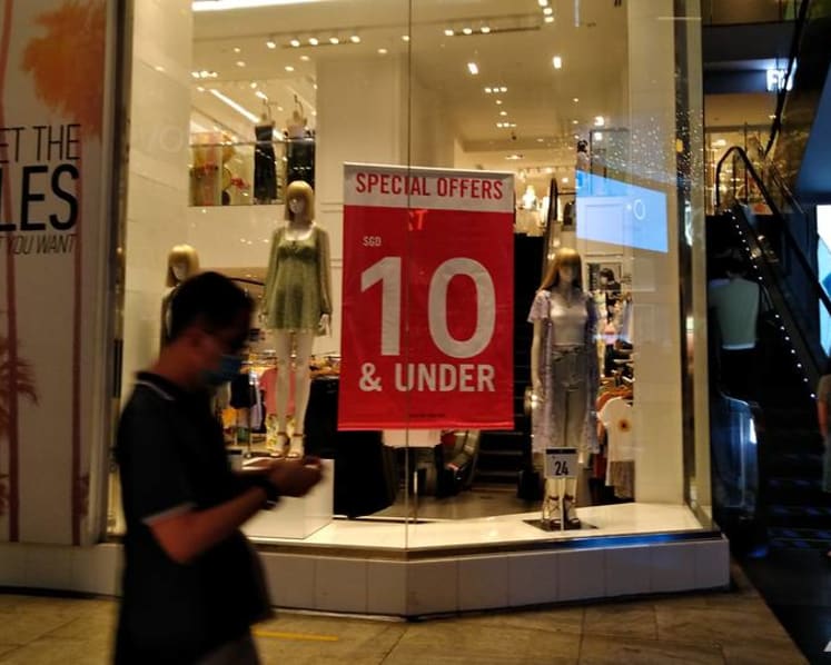 Commentary: S$5 tank tops can end up costing too much