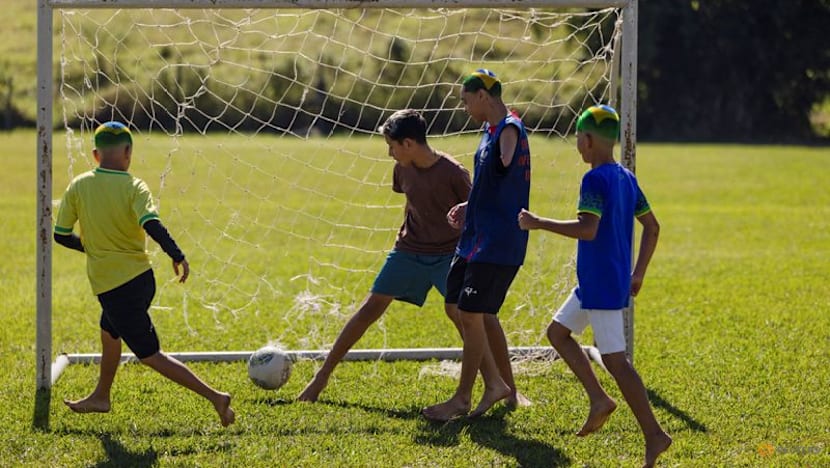 Barber shaves World Cup dreams into Brazilian fans' hair