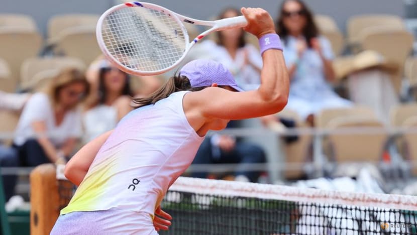 Swiatek digs herself out of deep hole, Alcaraz powers on at French Open