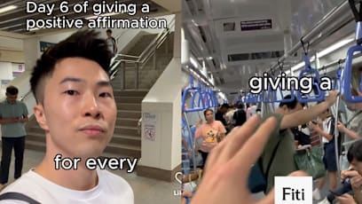 Man Reads Uplifting Messages To People On Streets Of S'pore; Gets Mostly Blank Stares In Return