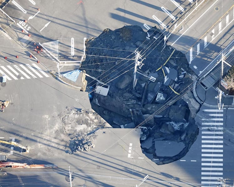 No sign of driver 8 days after truck fell into Japan sinkhole