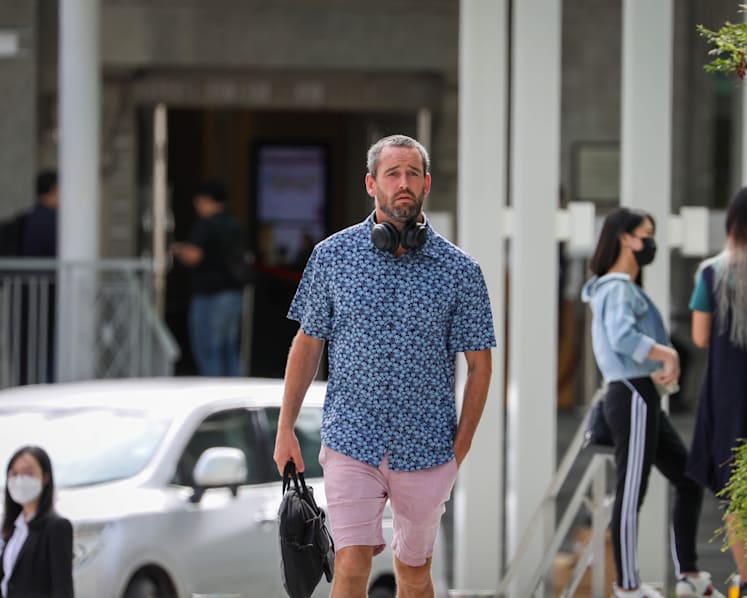 Man seen without mask in MRT gets new charge of similar offence outside court; bail revoked