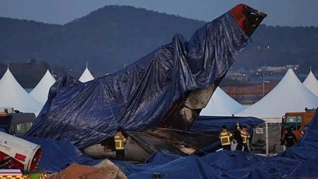 济州航空空难现场搜寻结束 大部分罹难者遗体已交致家属