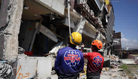 Rescuers race to reach trapped after powerful quake in southern Philippines