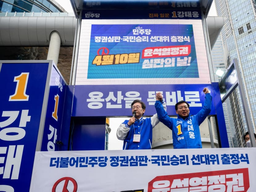 South Korea's main opposition Democratic Party of Korea leader Lee Jae-myung (left) and candidate Kang Tae-woong speak to supporters during a campaign event for the upcoming parliamentary elections in Seoul on March 28, 2024. South Korea's main opposition Democratic Party of Korea leader Lee Jae-myung (left) and candidate Kang Tae-woong speak to supporters during a campaign event for the upcoming parliamentary elections in Seoul on March 28, 2024.