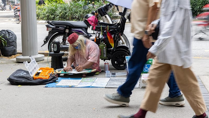 The former Singapore para-athlete who now sells art on the streets of Kuala Lumpur