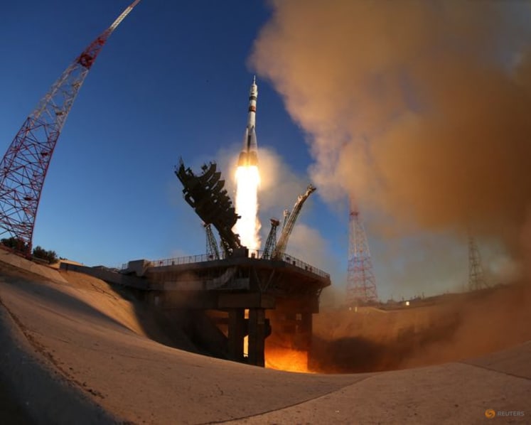 Russia sends American and two cosmonauts to space station with rare NASA chief visit
