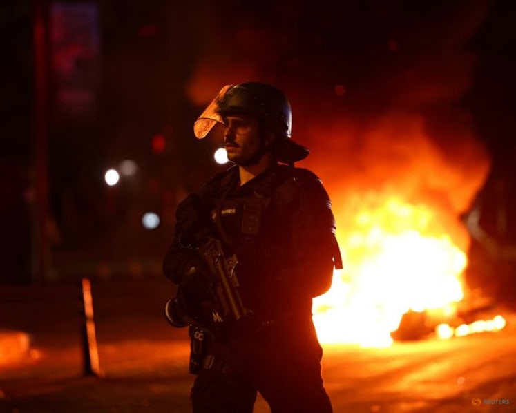 Jubilant PSG supporters spill onto Paris streets, some clashes with police