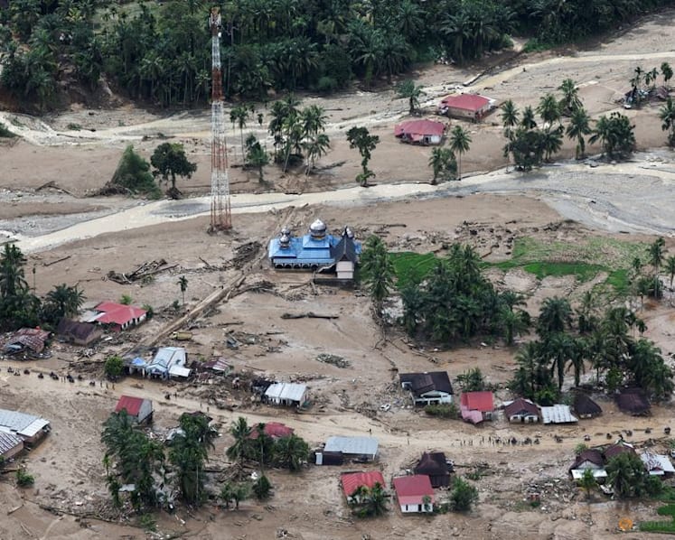 Indonesians pick up the pieces after floods ravage Sumatra; death toll hits 442