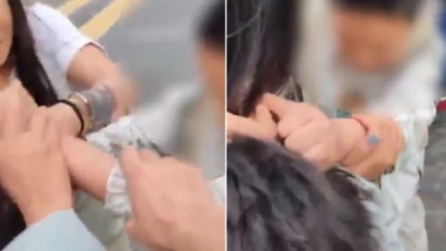 被顽儿当街挥拳扯发反露微笑 网民狠批：慈母多败儿