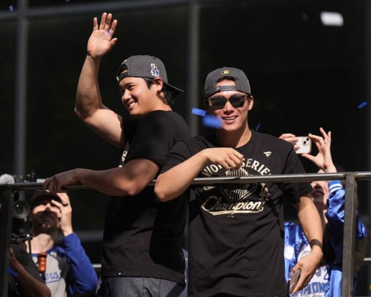 Baseball-Ohtani teases 'three-peat' as Dodgers parade draws Los Angeles crowds