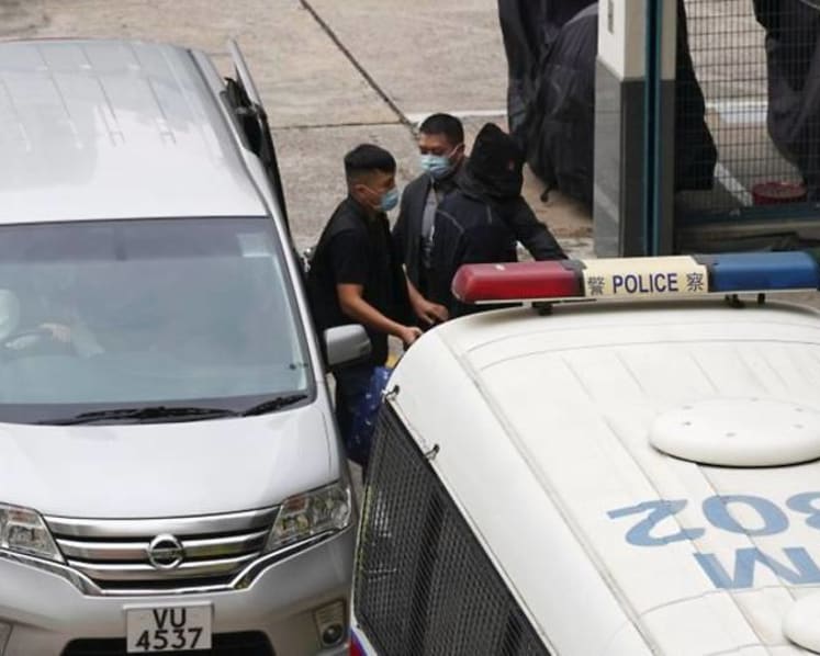 Activists freed from Chinese jail back in custody in Hong Kong