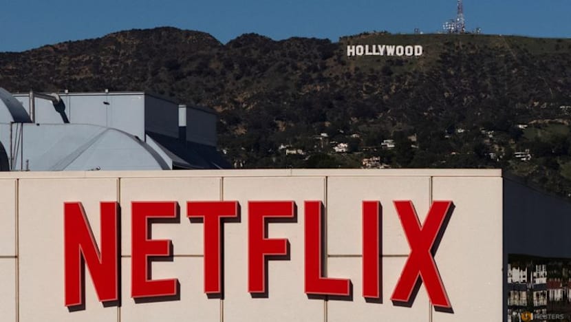 Netflix issues weak fourth-quarter forecast, shares drop 