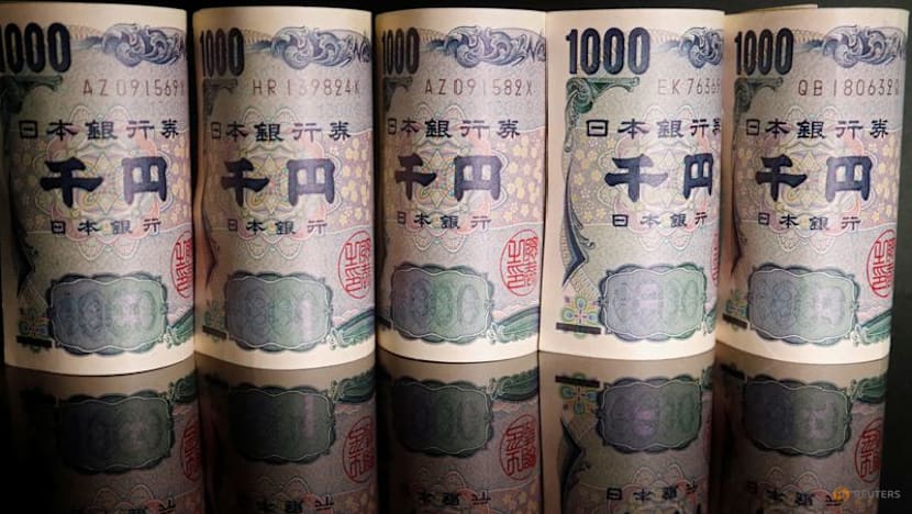 S&P affirms Japan debt rating but warns of cut if yen weakens much further