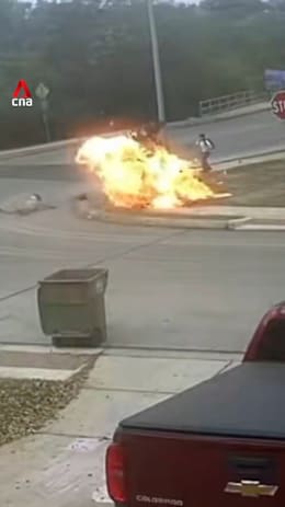 Fiery motorcycle crash narrowly misses Texas school children