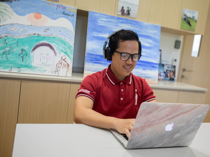 Mr Menchie Macomis is one of five specialists and more than 100 volunteers who support HealthServe’s 24-hour crisis helpline for migrant workers.