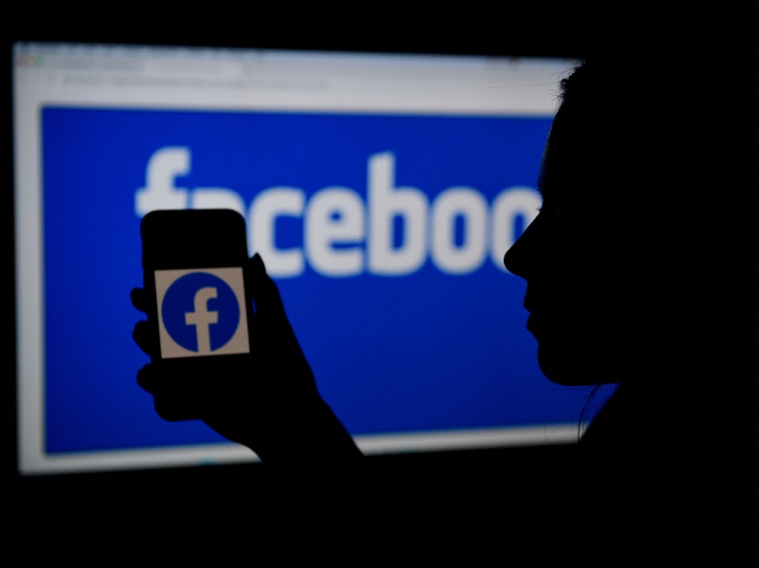 In this file photo illustration, a smart phone screen displays the logo of Facebook on a Facebook website background in Arlington, Virginia, US on April 7, 2021. In this file photo illustration, a smart phone screen displays the logo of Facebook on a Facebook website background in Arlington, Virginia, US on April 7, 2021.