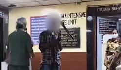 தலையில் அரிவாள்... அசராமல் நின்ற இளையர், அதிரவைத்த காணொளி