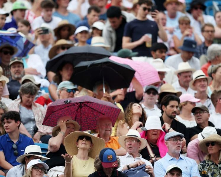 Keys wins Eastbourne Open as men's final postponed due to rain