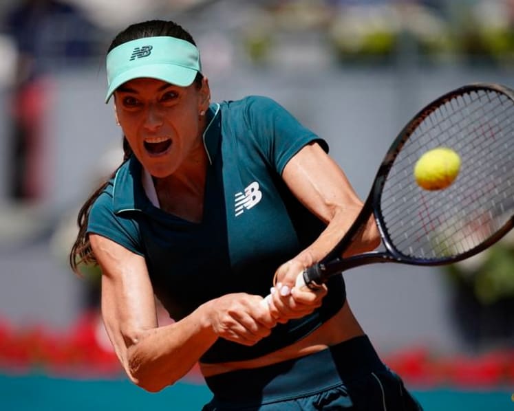 Gauff battles through illness to reach Madrid Open last 16