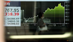 Asian shares pulls back from record highs as oil gains on Iran risk