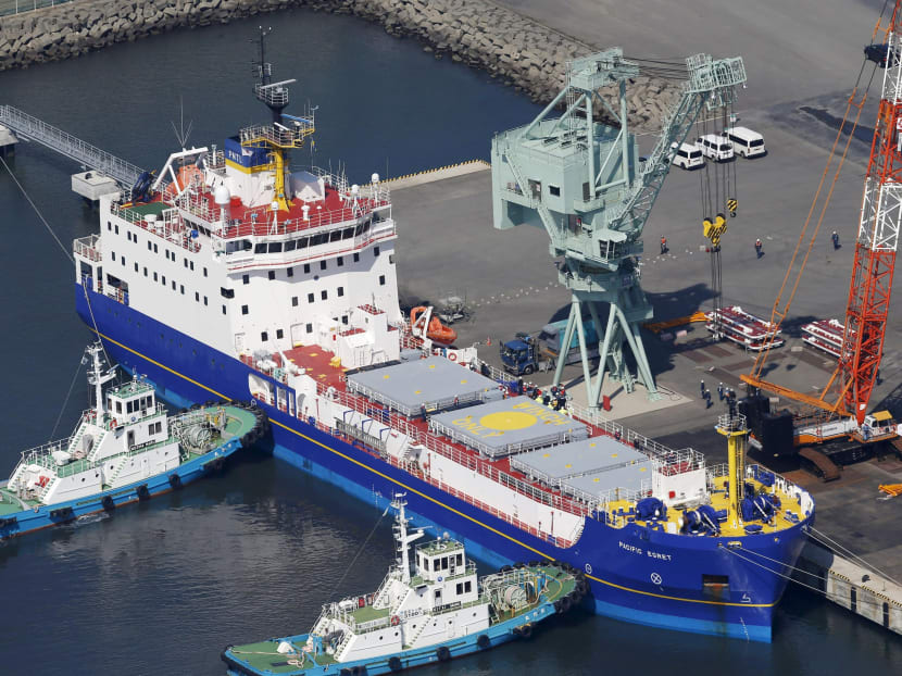 The Pacific Egret, an armed British ship, is anchored at a port in Tokai village, Ibakaki prefecture, in this aerial photo taken by Kyodo March 22, 2016. Photo: Kyodo News via REUTERS