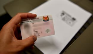 Police warn of scammers opening payment accounts using doctored soft copies of Singapore identity cards
