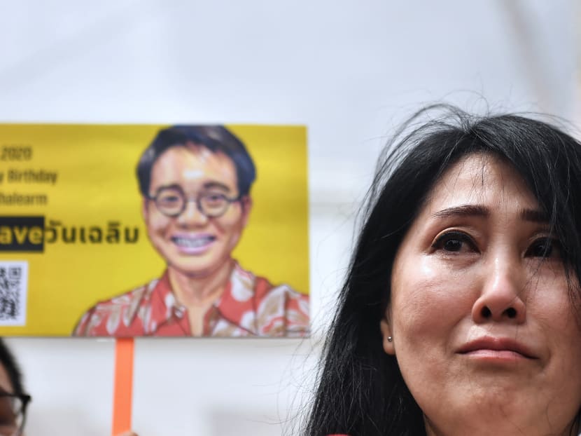 Ms Sitanan Satsaksit, sister of missing activist Wanchalearm Satsaksit, addresses the media after marking her brother's 38th birthday in front of the Cambodian Embassy in Bangkok, Thailand on Aug 11, 2020.