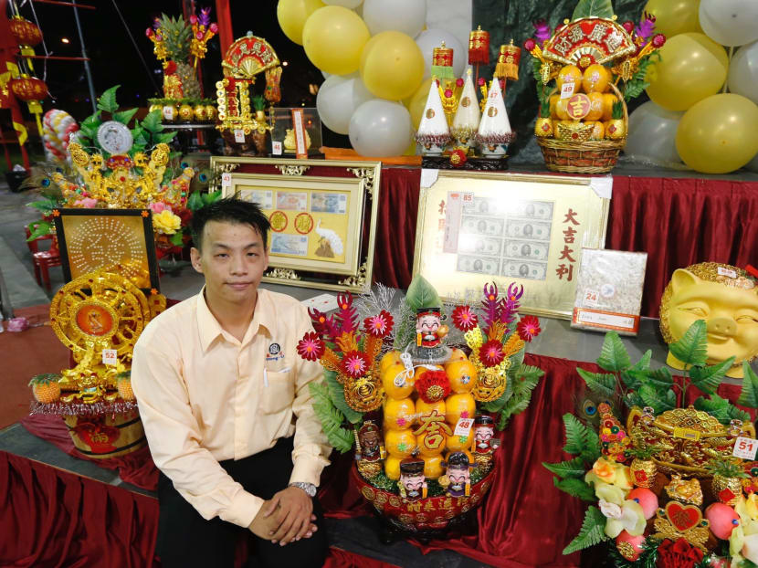 Kelvin Oh, 28, is one of the youngest getai auctioneers here and has been on the circuit for about 2 years now. Photo: Najeer Yusof