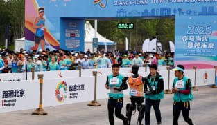 China pits humanoid robots against humans in half-marathon