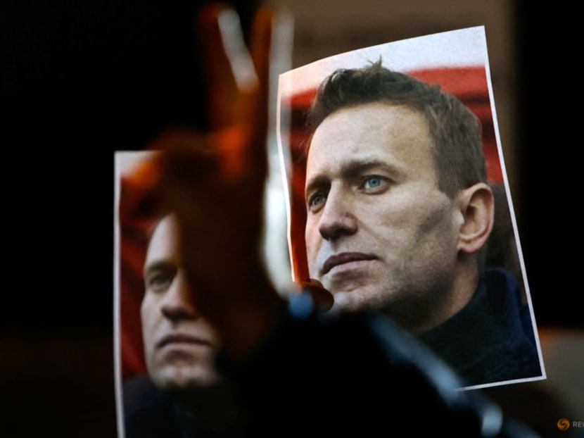 A person gestures in front of portraits of Russian opposition leader Alexei Navalny as people attend a protest and vigil held in front of the Russian embassy following the death of Navalny, in Kappara, Malta, on Feb 19, 2024. A person gestures in front of portraits of Russian opposition leader Alexei Navalny as people attend a protest and vigil held in front of the Russian embassy following the death of Navalny, in Kappara, Malta, on Feb 19, 2024.
