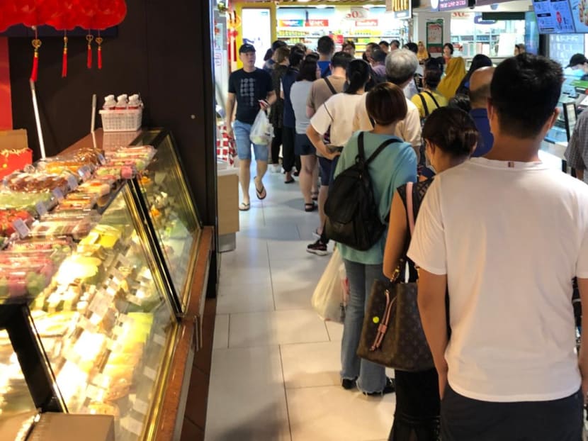 People queueing to buy surgical masks at White Sands mall in Pasir Ris on Jan 29, 2020. Those at the end of the queue did not get any after waiting because stocks had run out.