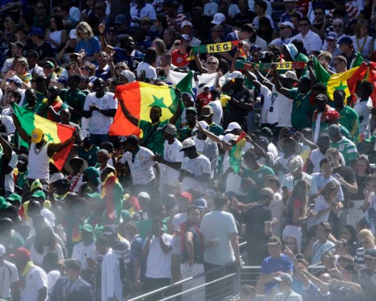 Immigrants, international fans step up with Senegal supporters stuck at home