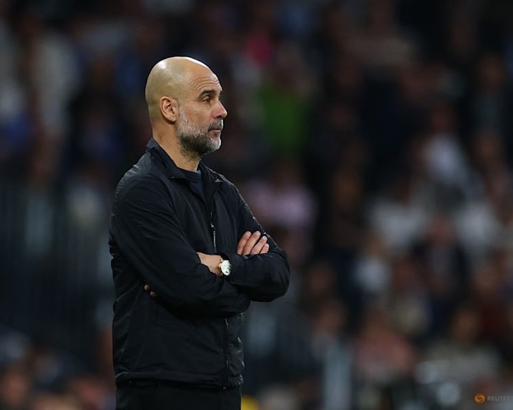 Guardiola defiant despite City's Champions League mauling