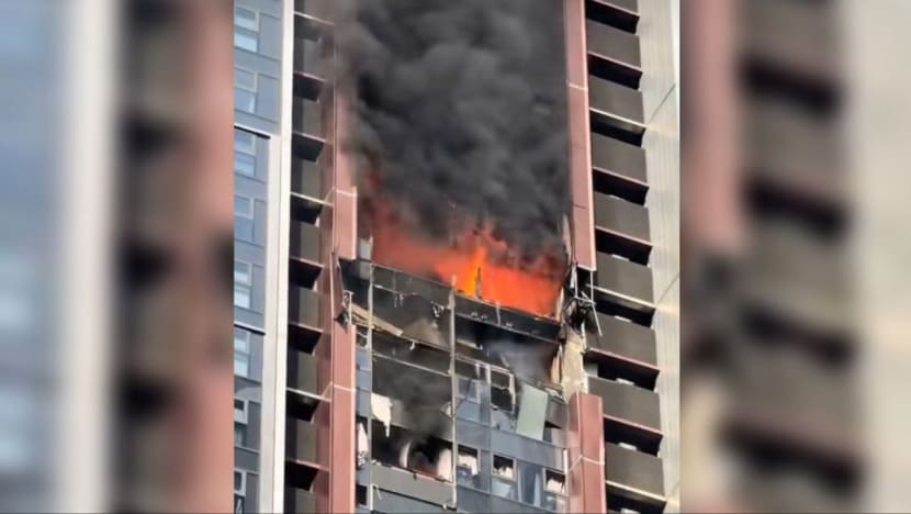 Powerful blast rocks residential high-rise in southern China Powerful blast rocks residential high-rise in southern China