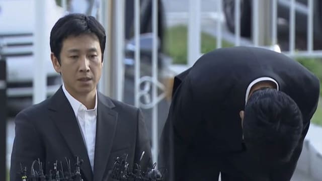 李善均现身警局　90度鞠躬哽咽道歉