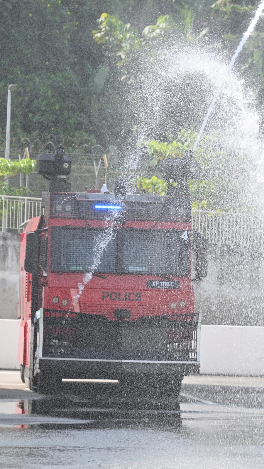 Singapore police unveil new tactical strike vehicles and water cannon fleet