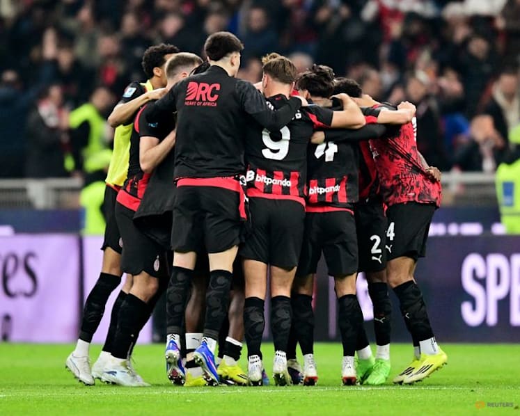 Milan edge Inter in derby to keep distant title chase alive