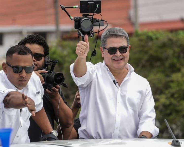 Honduras ex-president Hernandez returns home after Trump pardon
