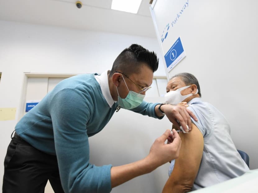 Taxi driver Tham Yuet Kok (right), 72, was among the first taxi drivers to receive the Covid-19 vaccination on Feb 23, 2021. Taxi driver Tham Yuet Kok (right), 72, was among the first taxi drivers to receive the Covid-19 vaccination on Feb 23, 2021.